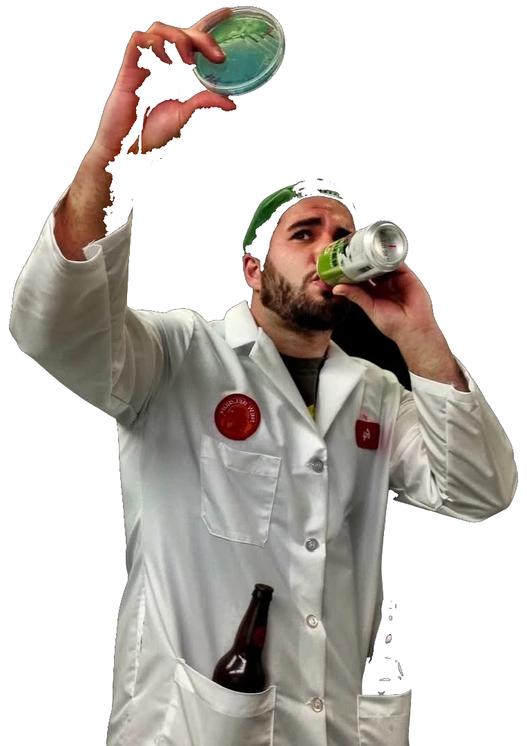 Guy Stewart holding up a petri dish